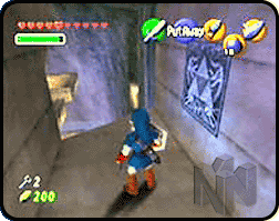 Link standing next to a triforce emblem on the wall.