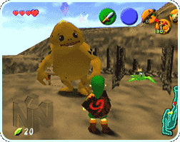 Link looks at a Goron who is standing in front of a Bomb Flower on a mountain.